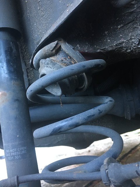 Broken spring and twisted bumper